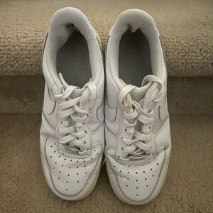 Woman’s Nike Air Force 1 shoes